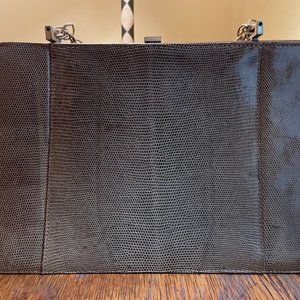 brown vintage snakeskin clutch with leather interior